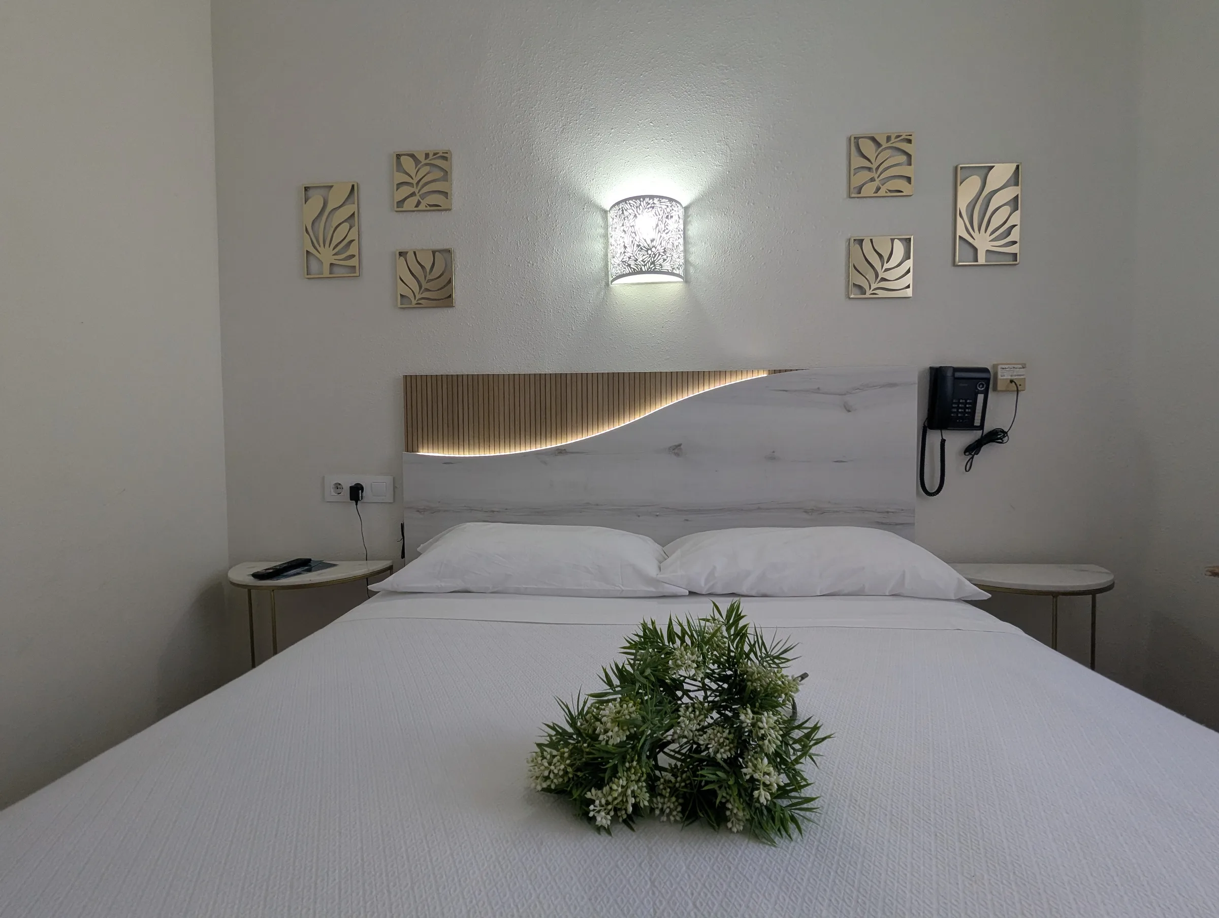 Dos camas en habitación doble económica de Hostal La Mexicana
